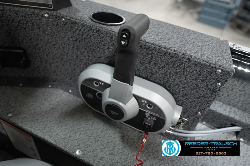 Slide: The Image of 2026 Lund 1800 Explorer Sport throttle control on a textured gray panel. - 96