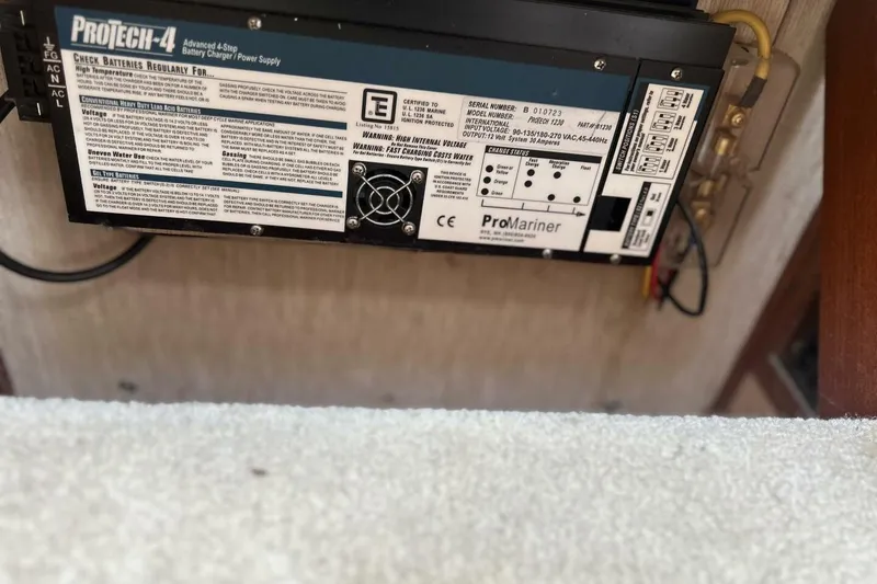 Slide: The Image of ProMariner ProTech-4 battery charger in 1985 Carver 3207 Aft Cabin boat. - 30
