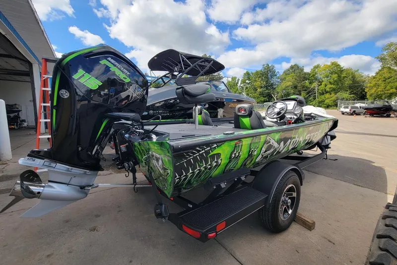 Slide: The Image of 2023 Ranger RT188 boat with vibrant graphics and Mercury Pro XS 115 engine. - 3