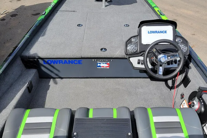 Slide: The Image of 2023 Ranger RT188 boat interior with Lowrance electronics and steering wheel. - 4