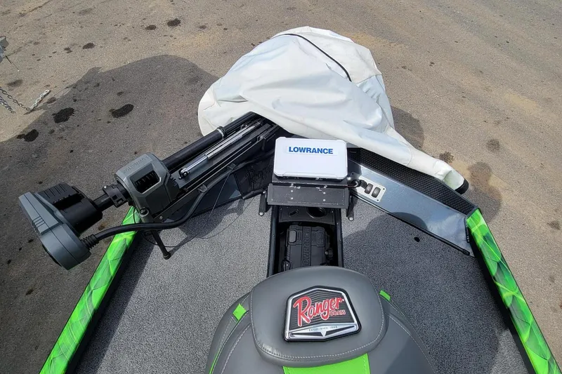 Slide: The Image of 2023 Ranger RT188 boat with Lowrance equipment and green accents on deck. - 6