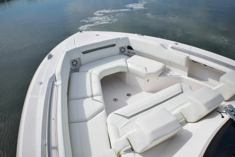 Slide: The Image of Luxurious seating area on 2025 Tiara Yachts 43 LS, featuring elegant white upholstery. - 25