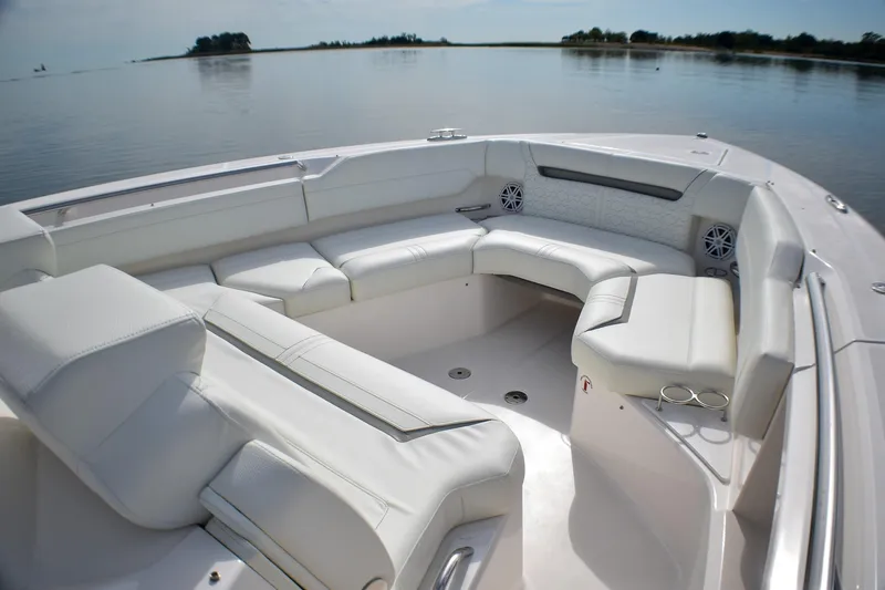 Slide: The Image of Luxurious seating area on 2025 Tiara Yachts 43 LS, featuring elegant white upholstery. - 26