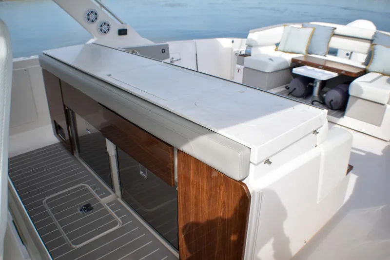 Slide: The Image of 2025 Tiara Yachts 43 LS luxury yacht interior with elegant seating and modern design. - 32