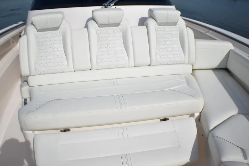 Slide: The Image of Luxurious white seating on 2025 Tiara Yachts 43 LS, featuring elegant design and comfort. - 36