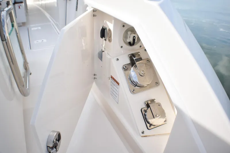 Slide: The Image of 2025 Tiara Yachts 43 LS yacht deck with control panel and fittings. - 39