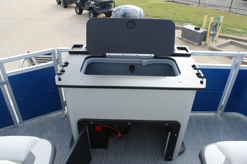 Slide: The Image of 2026 Sun Tracker Fishin' Barge 20 DLX with onboard sink and storage. - 18