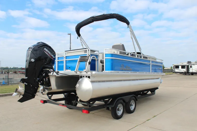 Slide: The Image of 2026 Sun Tracker Fishin' Barge 20 DLX pontoon boat with Mercury engine on trailer. - 8