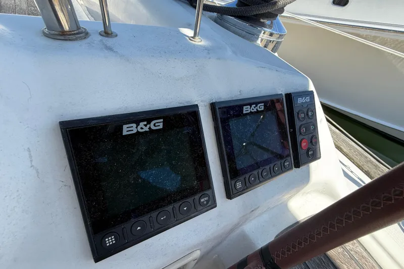 Slide: The Image of B&G navigation instruments on a 2010 Beneteau Oceanis 43 yacht dashboard. - 15