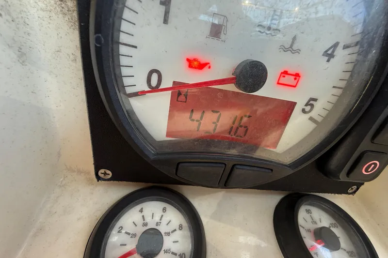 Slide: The Image of Close-up of Beneteau Oceanis 43 2010 boat dashboard with gauges and warning lights. - 22