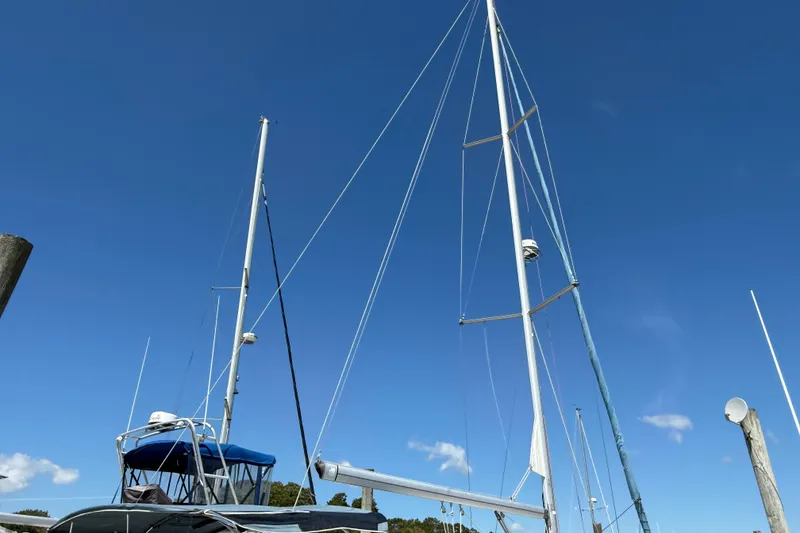 Slide: The Image of Sailboat mast of 2010 Beneteau Oceanis 43 against clear blue sky. - 3