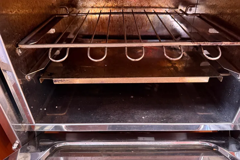 Slide: The Image of Interior of an oven on a 2010 Beneteau Oceanis 43 sailboat. - 38