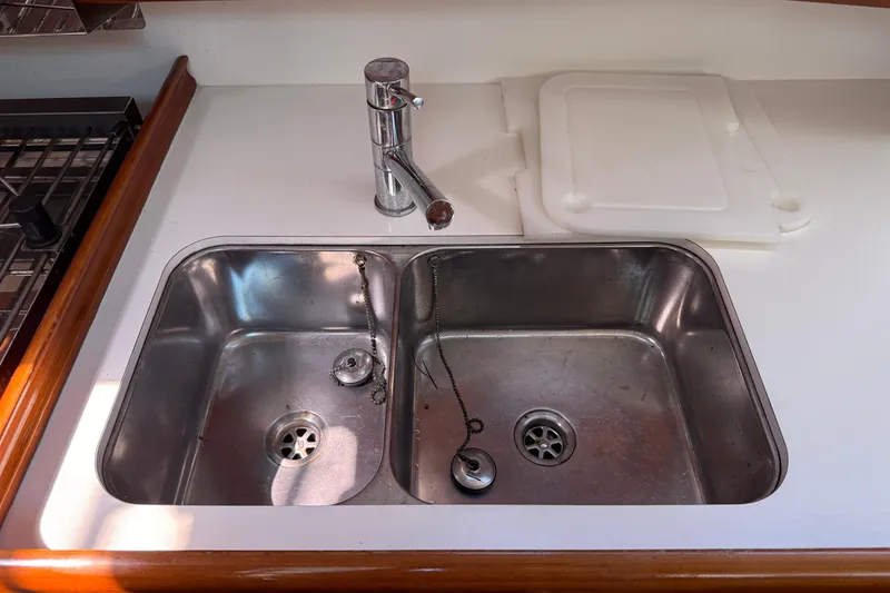 Slide: The Image of Stainless steel sink in 2010 Beneteau Oceanis 43 yacht kitchen. - 44