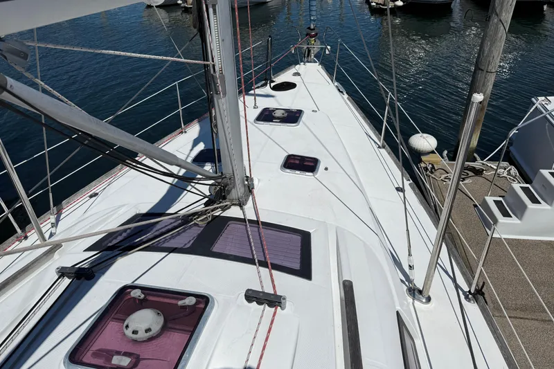 Slide: The Image of Deck view of 2010 Beneteau Oceanis 43 sailboat docked at marina. - 5