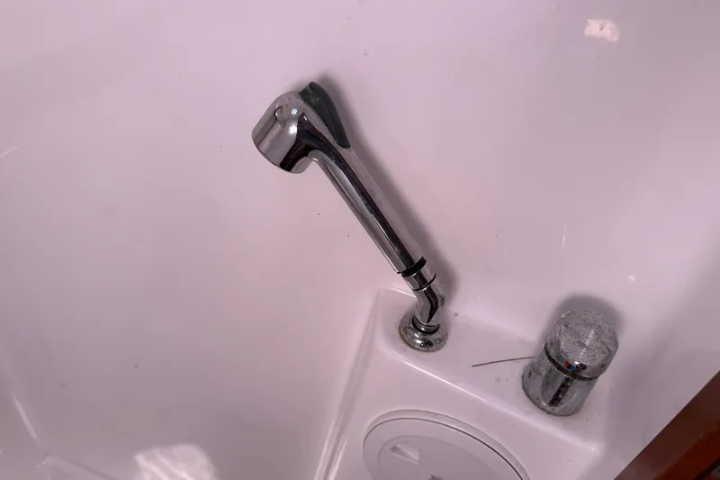Slide: The Image of Chrome faucet and control knob on Beneteau Oceanis 43 yacht, 2010 model. - 63