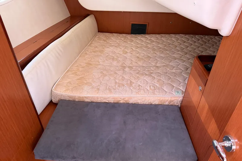 Slide: The Image of Cozy cabin interior of 2010 Beneteau Oceanis 43 sailboat with comfortable mattress. - 65