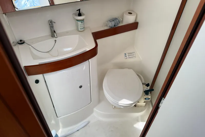 Slide: The Image of Bathroom interior of 2010 Beneteau Oceanis 43 yacht, featuring sink and toilet. - 70