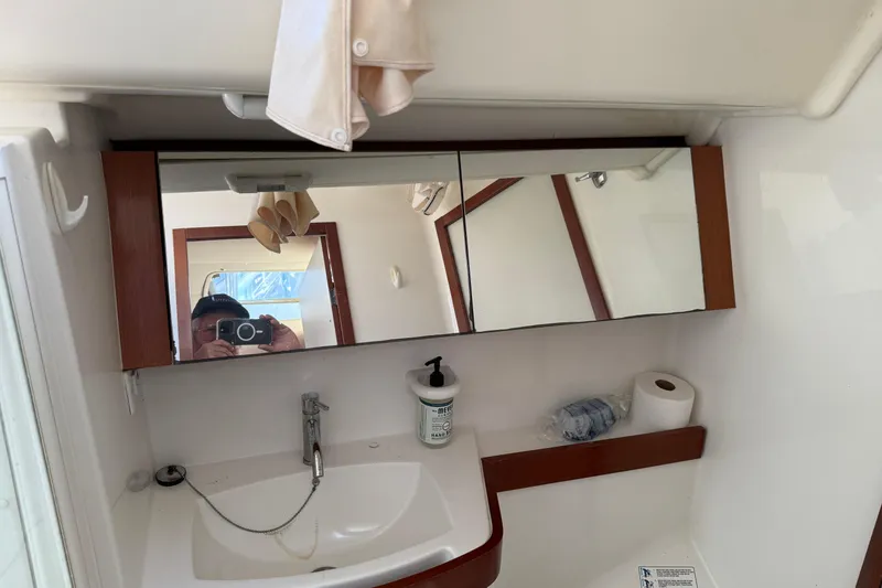 Slide: The Image of Bathroom interior of 2010 Beneteau Oceanis 43 yacht with mirror and sink. - 71