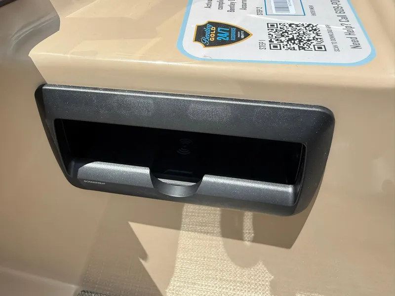 Slide: The Image of 2026 Bentley Pontoons Legacy 243 Swingback wireless charging station detail. - 11