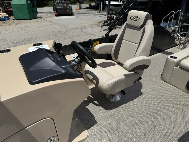 Slide: The Image of 2026 Bentley Pontoons Legacy 243 Swingback captain's chair and helm, featuring luxurious design. - 6