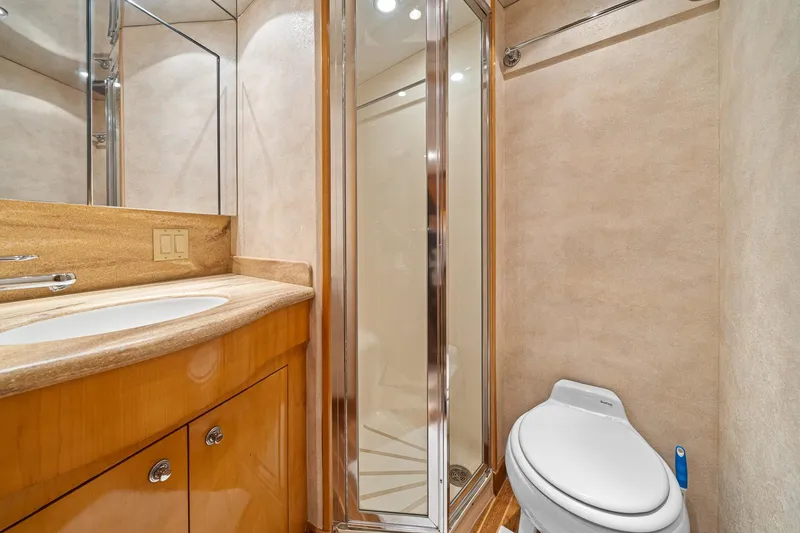 Slide: The Image of Luxurious bathroom in 2002 Hatteras 60 Convertible yacht with shower and modern fixtures. - 19