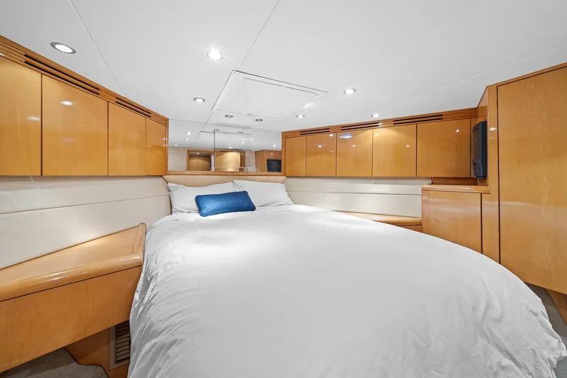 Slide: The Image of Luxurious cabin interior of 2002 Hatteras 60 Convertible yacht with wood cabinetry. - 21