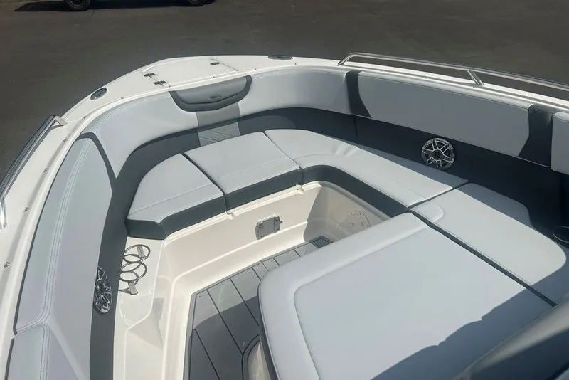 Slide: The Image of 2026 Chaparral 280 OSX boat interior with sleek seating and modern design. - 14
