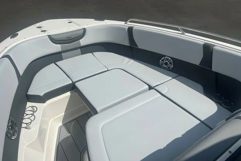 Slide: The Image of 2026 Chaparral 280 OSX boat interior with spacious seating and modern design. - 17