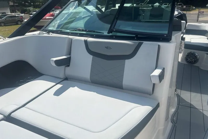 Slide: The Image of 2026 Chaparral 280 OSX boat interior with sleek seating and modern design. - 22