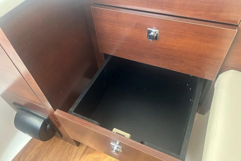 Slide: The Image of Open wooden drawer in Chaparral 280 OSX, 2026 model, with sleek design. - 37