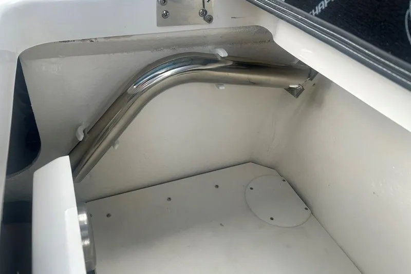 Slide: The Image of Interior compartment of 2026 Chaparral 280 OSX boat, featuring stainless steel tubing. - 62