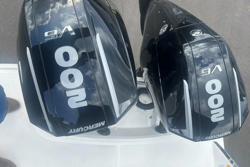 Slide: The Image of Twin Mercury V6 200 outboard engines on a 2026 Chaparral 280 OSX boat. - 65