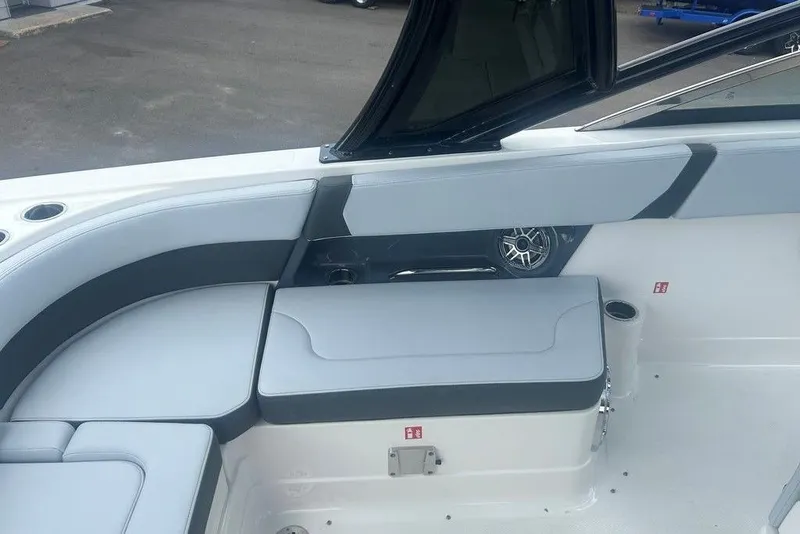 Slide: The Image of 2026 Chaparral 280 OSX boat interior with sleek seating and modern design. - 68