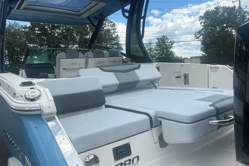 Slide: The Image of 2026 Chaparral 280 OSX boat with spacious seating and sleek design. - 74