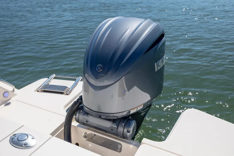 Slide: The Image of 2023 Grady-White Freedom 235 boat with Yamaha outboard motor on water. - 31