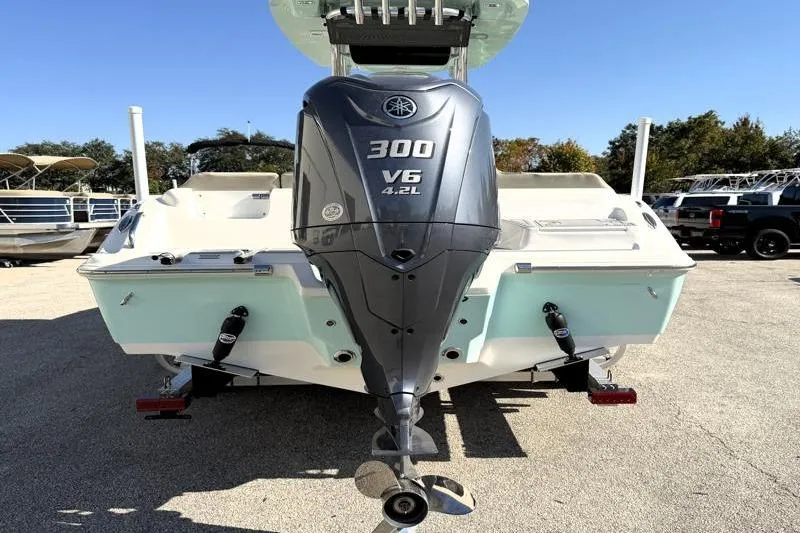 Slide: The Image of 2025 Key West 239 FS boat with Yamaha 300 V6 outboard engine, rear view. - 11