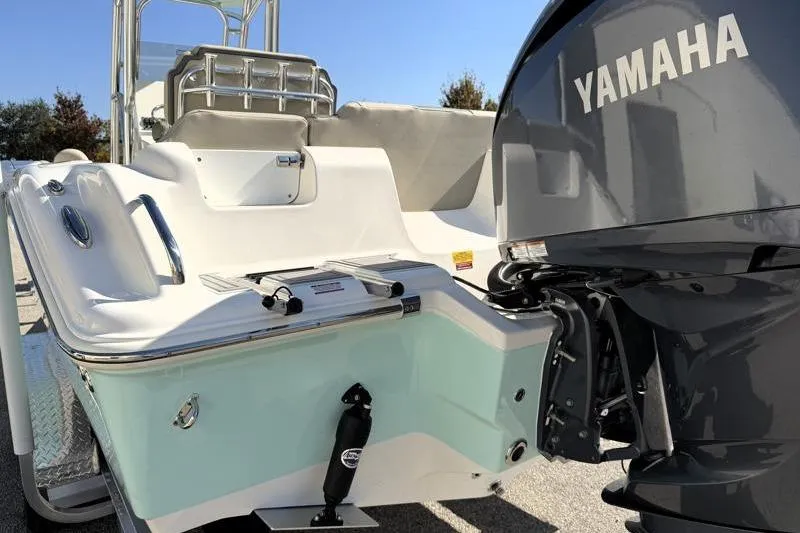 Slide: The Image of 2025 Key West 239 FS boat with Yamaha outboard motor, rear view. - 14