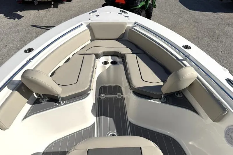 Slide: The Image of 2025 Key West 239 FS boat interior with cushioned seating and sleek design. - 21