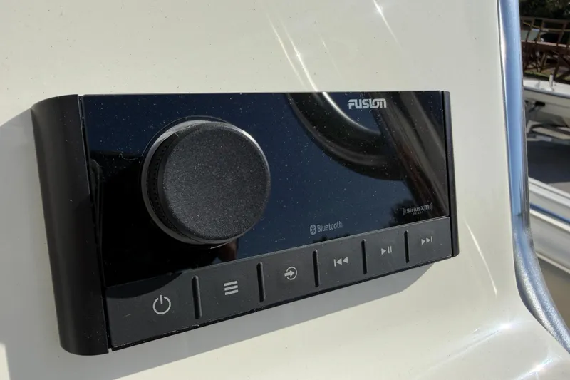 Slide: The Image of Fusion audio system on 2025 Key West 239 FS boat dashboard. - 36