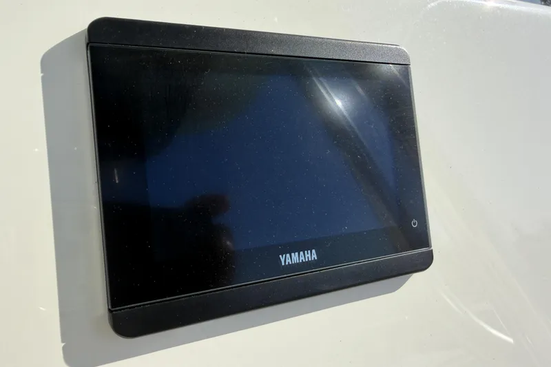 Slide: The Image of Yamaha display screen on 2025 Key West 239 FS boat dashboard. - 37