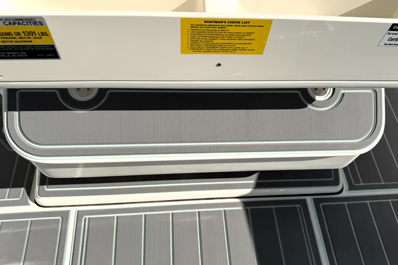 Slide: The Image of 2025 Key West 239 FS boat interior with checklist and capacity labels. - 38