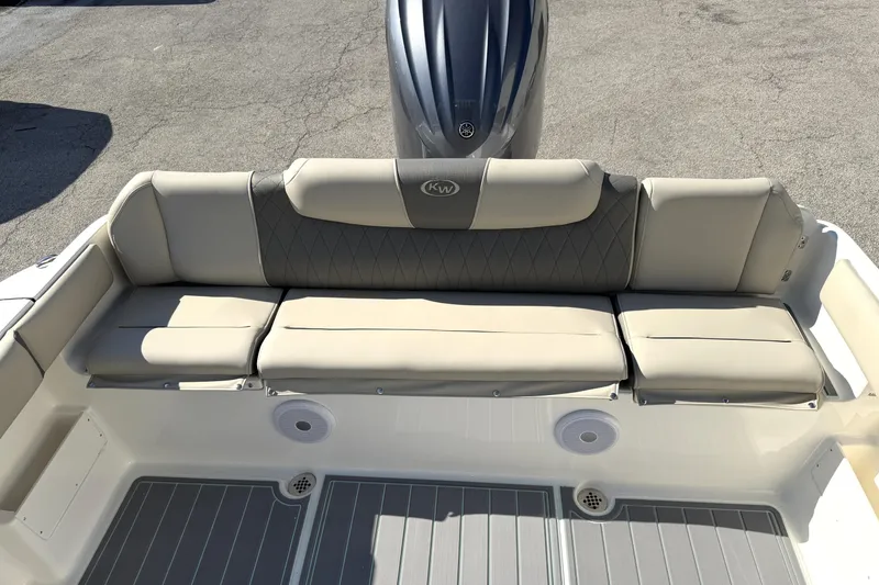 Slide: The Image of 2025 Key West 239 FS boat with cushioned seating and sleek design. - 42