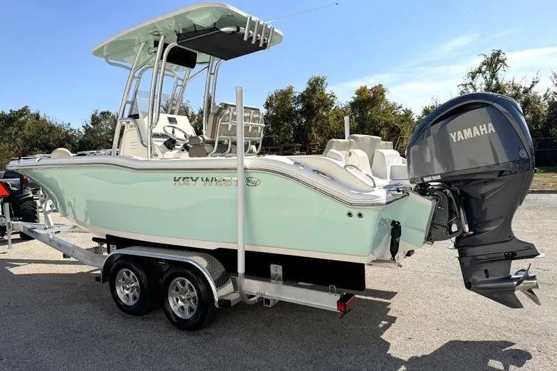 Slide: The Image of 2025 Key West 239 FS boat on trailer with Yamaha outboard motor. - 5