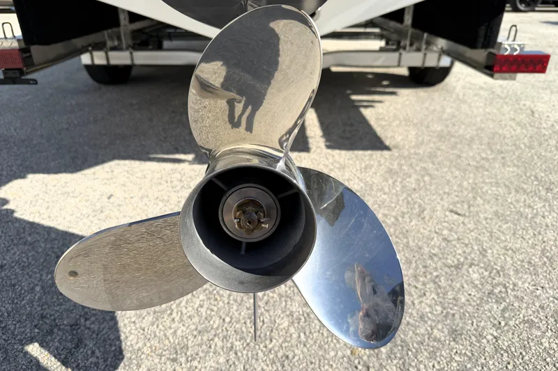 Slide: The Image of Close-up of a 2025 Key West 239 FS boat propeller on a trailer. - 57