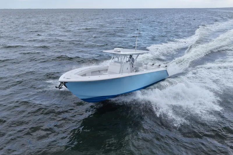 Slide: The Image of 2019 SeaHunter 33 Tournament boat cruising on open water. - 36