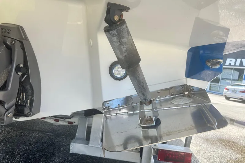 Slide: The Image of Close-up of a 2020 Monterey M4 boat's trim tab and outdrive mechanism. - 13