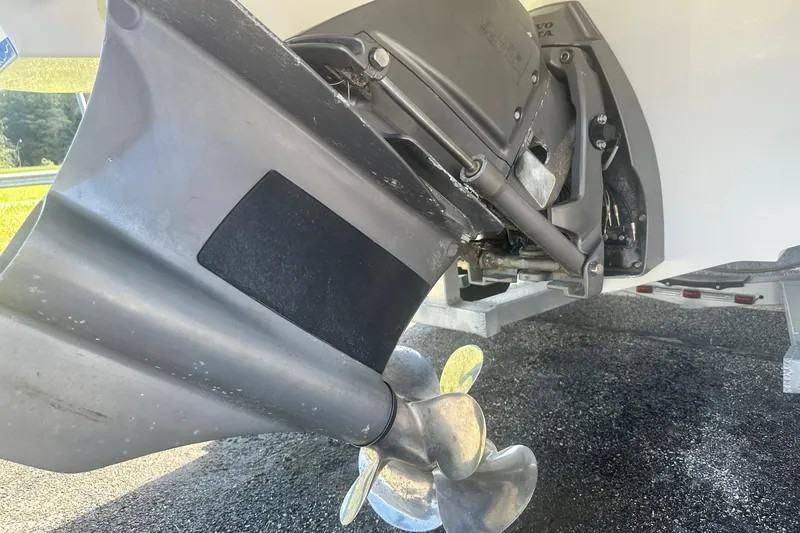 Slide: The Image of Close-up of a 2020 Monterey M4 boat propeller and outdrive on a trailer. - 14