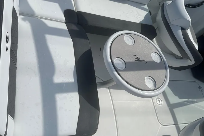 Slide: The Image of Interior of a 2020 Monterey M4 boat with seating and a round table. - 16