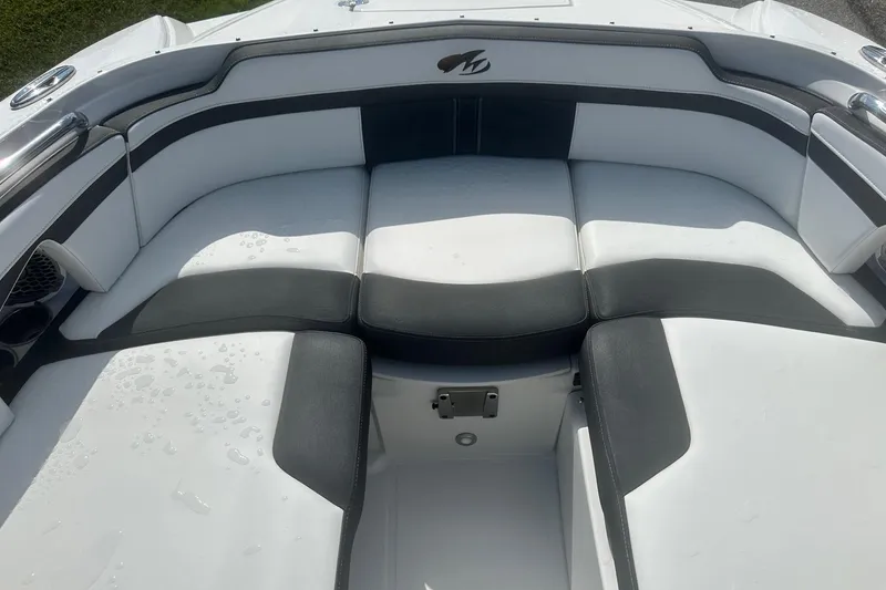 Slide: The Image of 2020 Monterey M4 boat interior with sleek black and white seating design. - 37