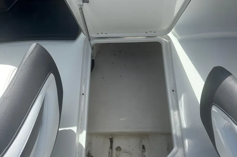 Slide: The Image of Open storage compartment in a 2020 Monterey M4 boat interior. - 38